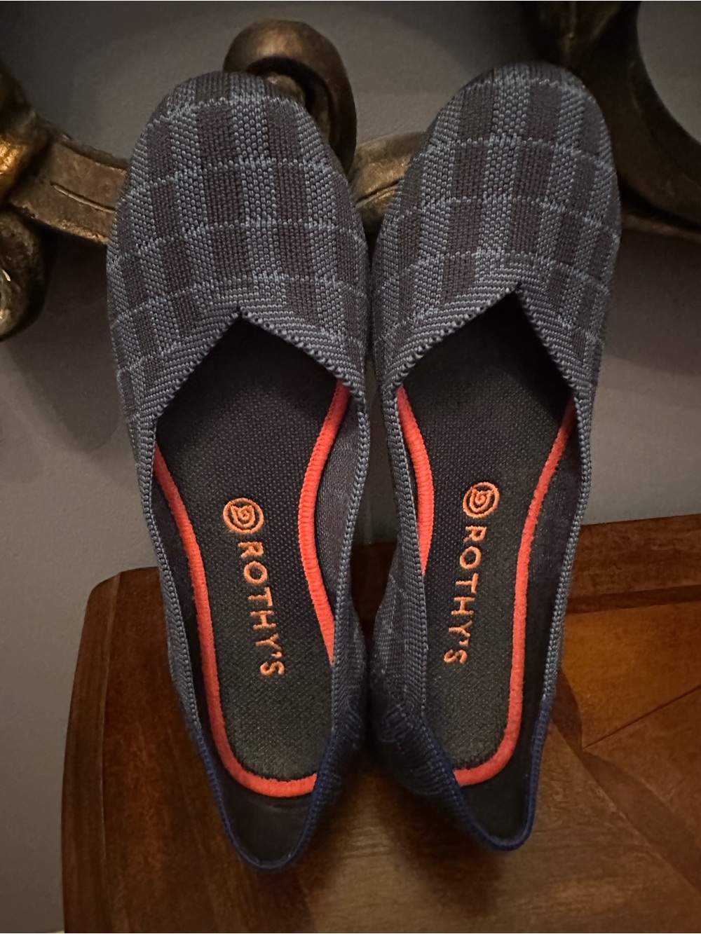Rothy's Navy Check Slip-On Flats with Orange Accents